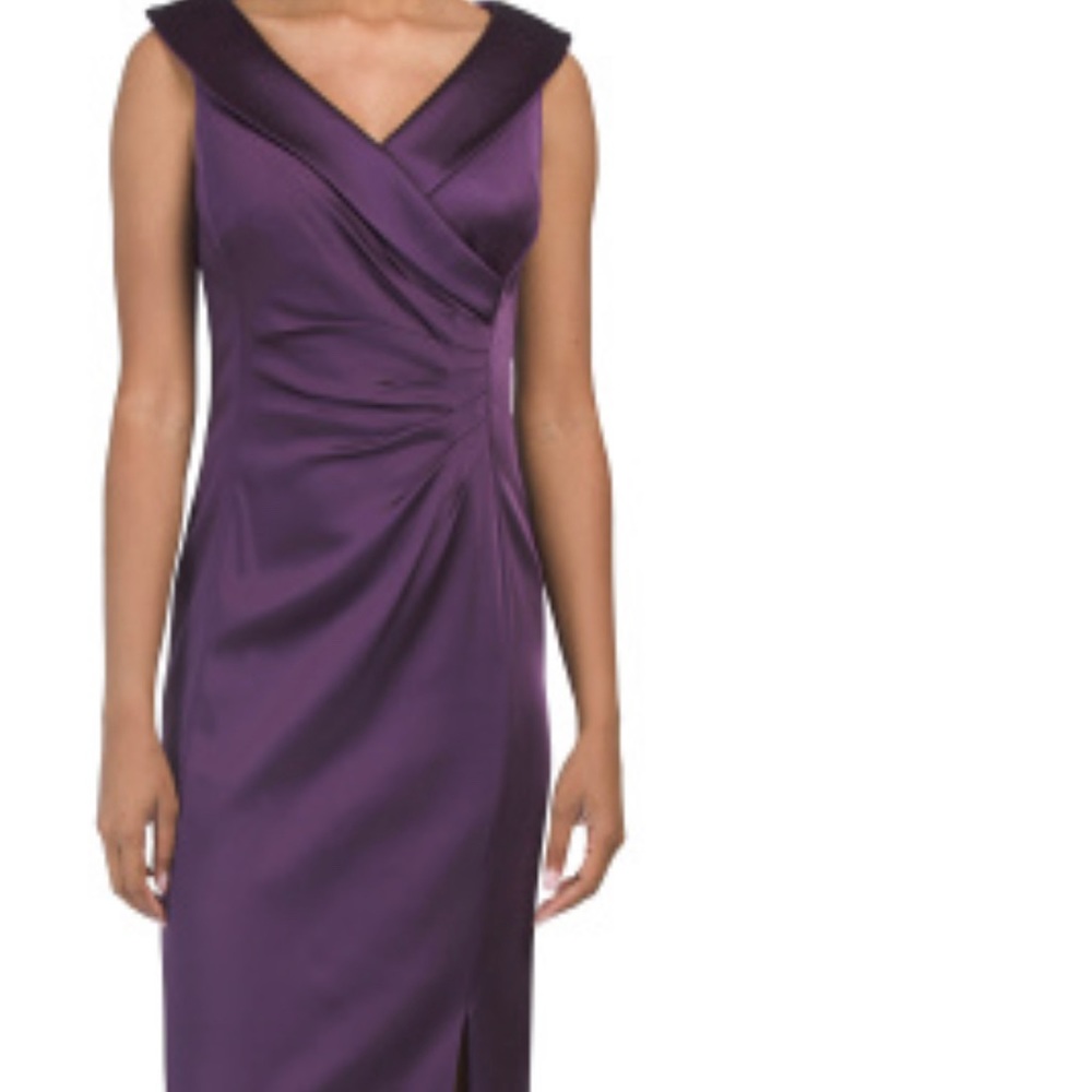 Dress formal- prom or homecoming. Slit from thigh to floor. Purple/lavender